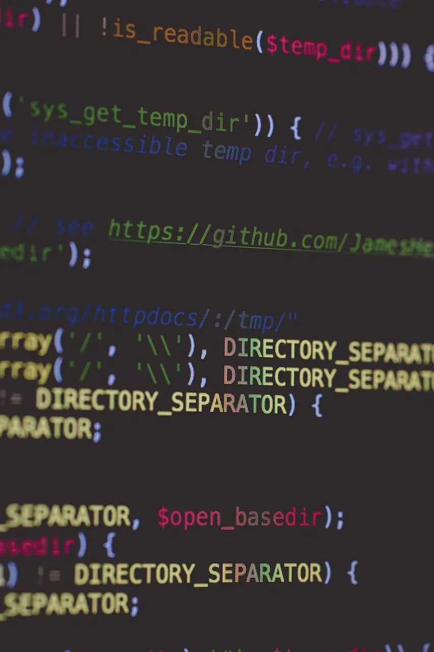 Close-up of PHP source code on a developer's computer screen for custom web development