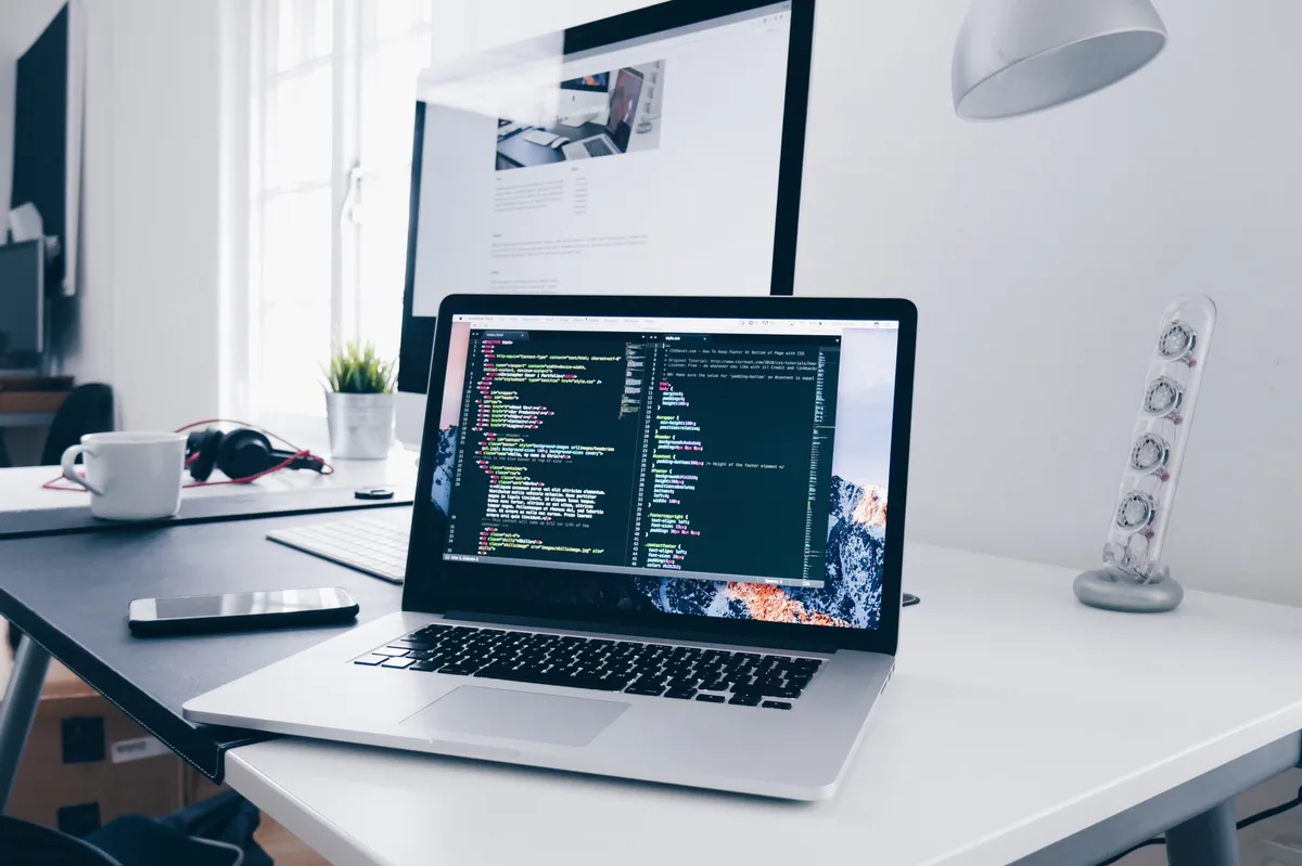 Next.js Development Developer reviewing a server-rendered Next.js application in a terminal and browser